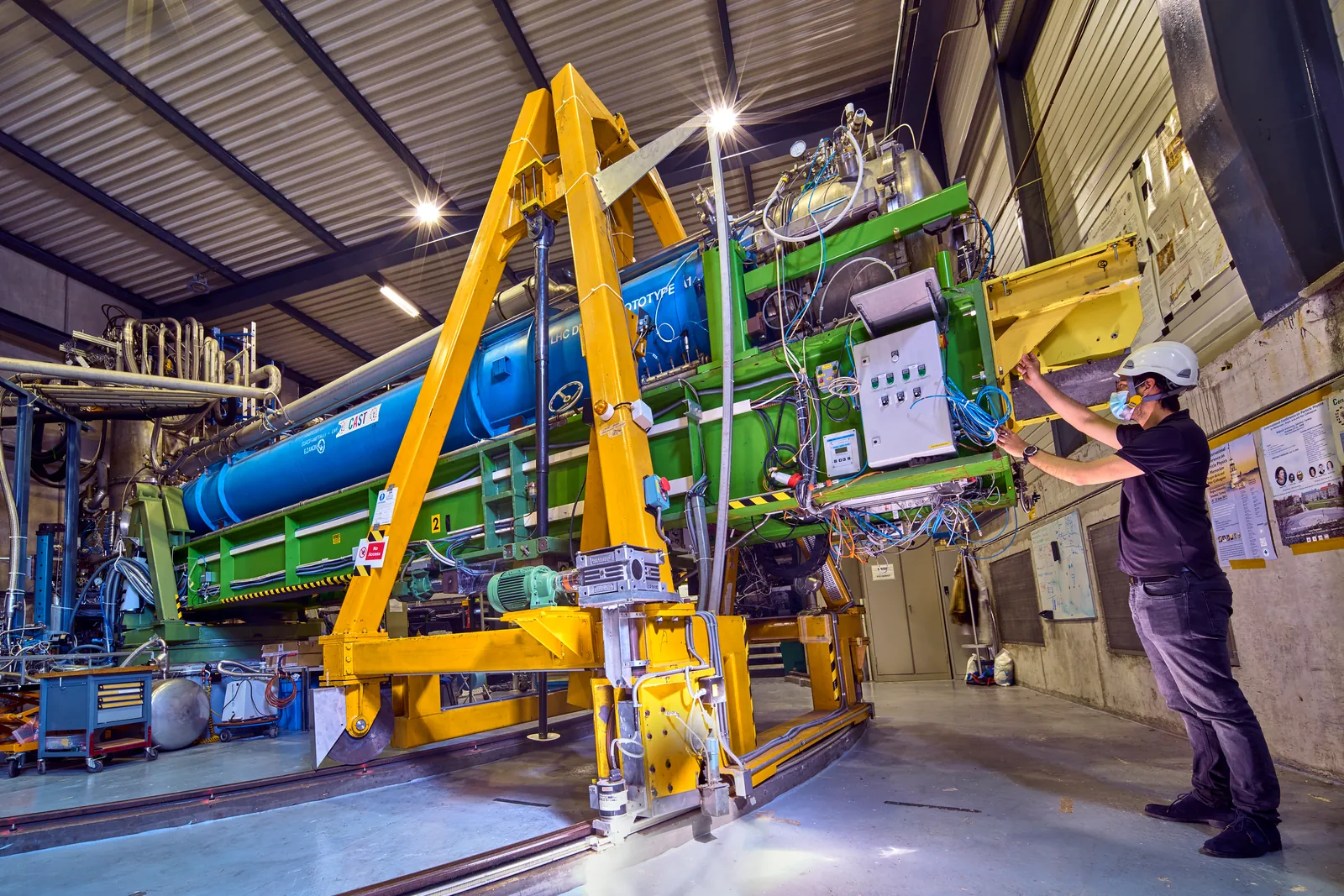 A physicist at work on the CERN Axion Solar Telescope, which searched for dark matter particles from the Sun