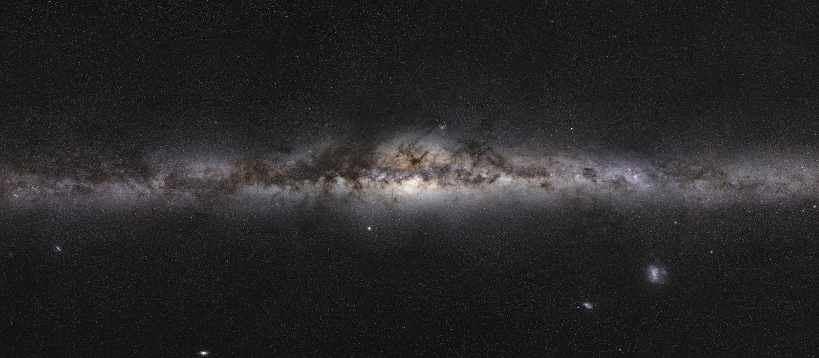 Panorama of the whole Milky Way with its bright central bulge and dark dust lanes