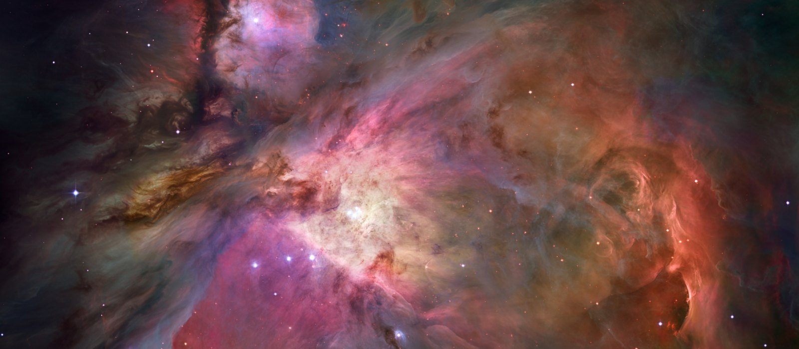 The central part of the Orion Nebula, a cloud of glowing gas, seen by the Hubble Space Telescope